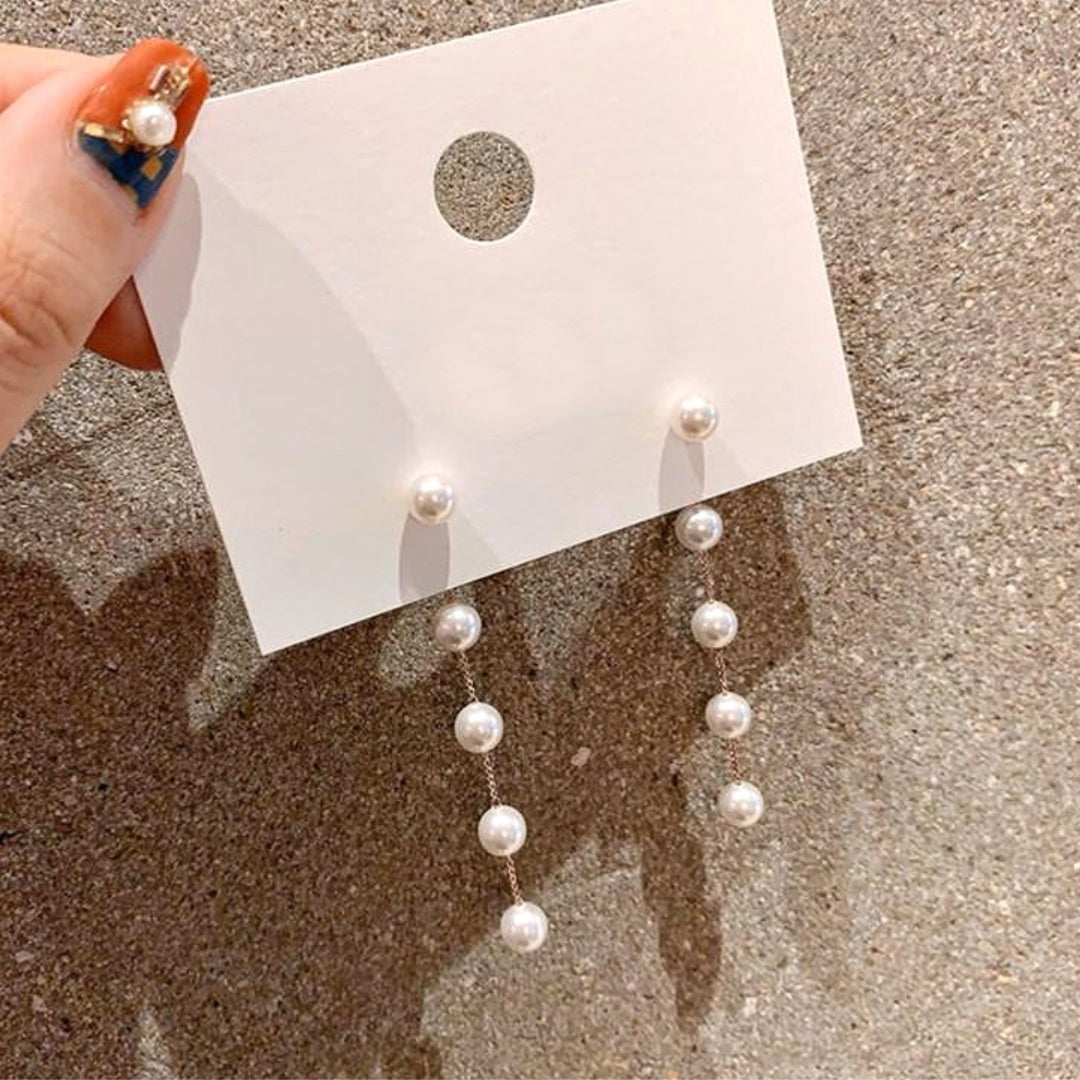 Pearl Dangling in Gold