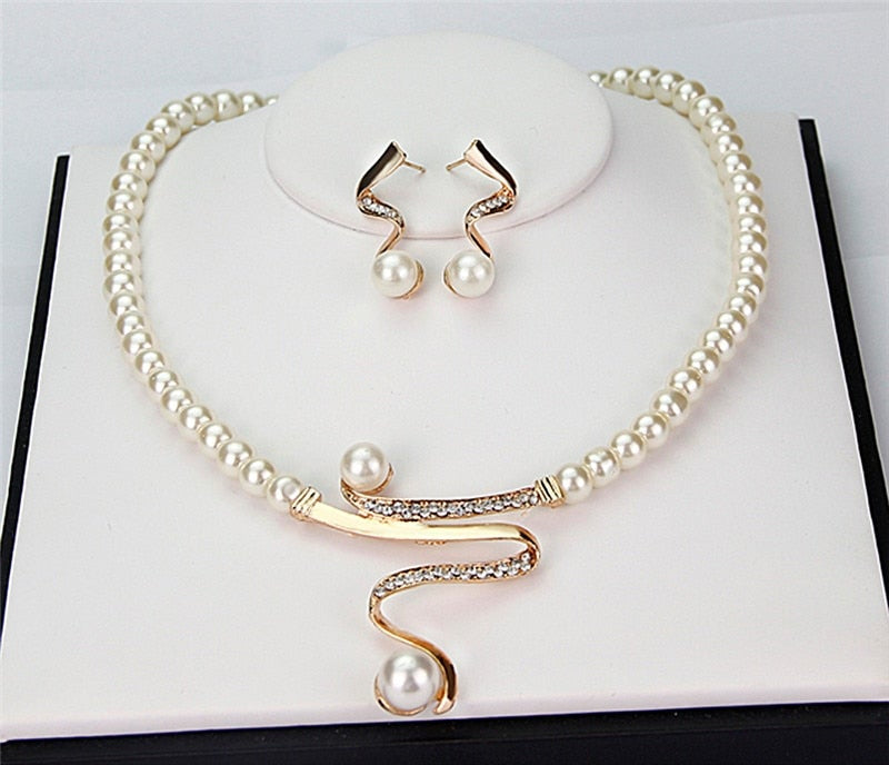 Necklace with natural pearls + earrings set