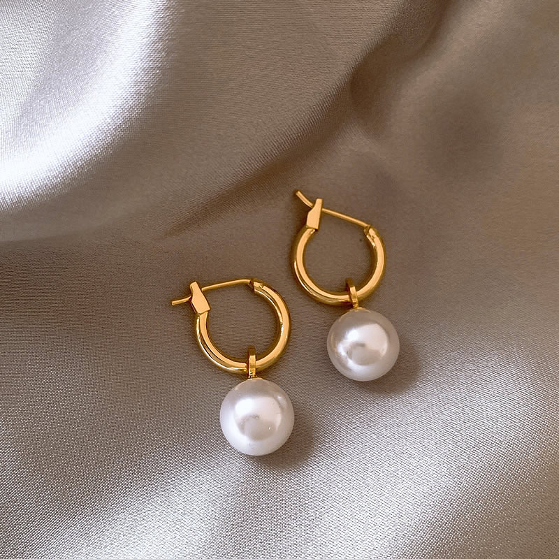 Elegant gold earrings with beads