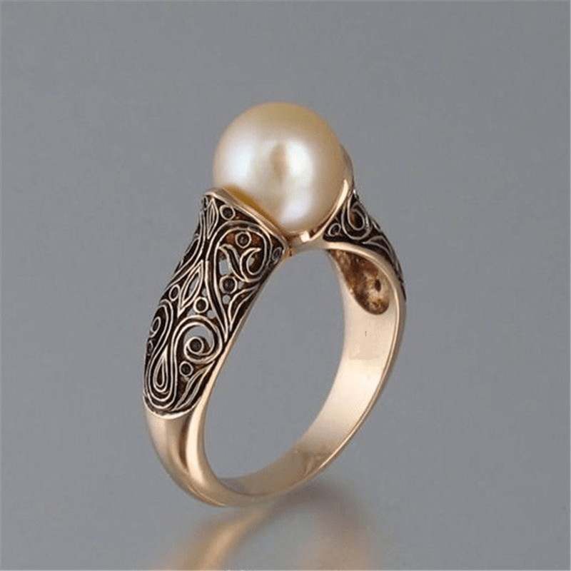 Gold pearl ring in vintage style