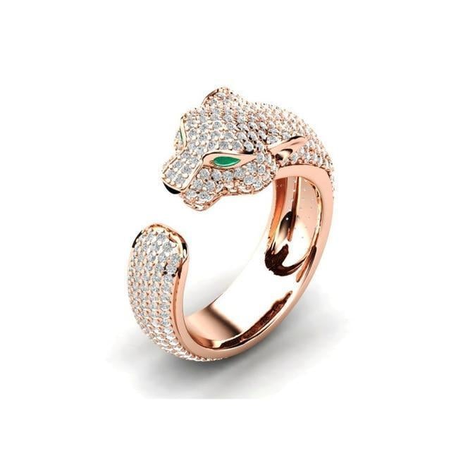 18-carat silver and 18-carat rose gold adjustable Jaguar ring with green cubic zirconia eyes