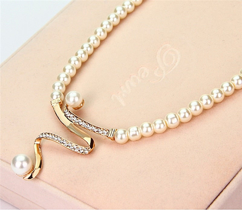 Necklace with natural pearls + earrings set