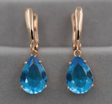 Elegant Blue Crystal  in Gold