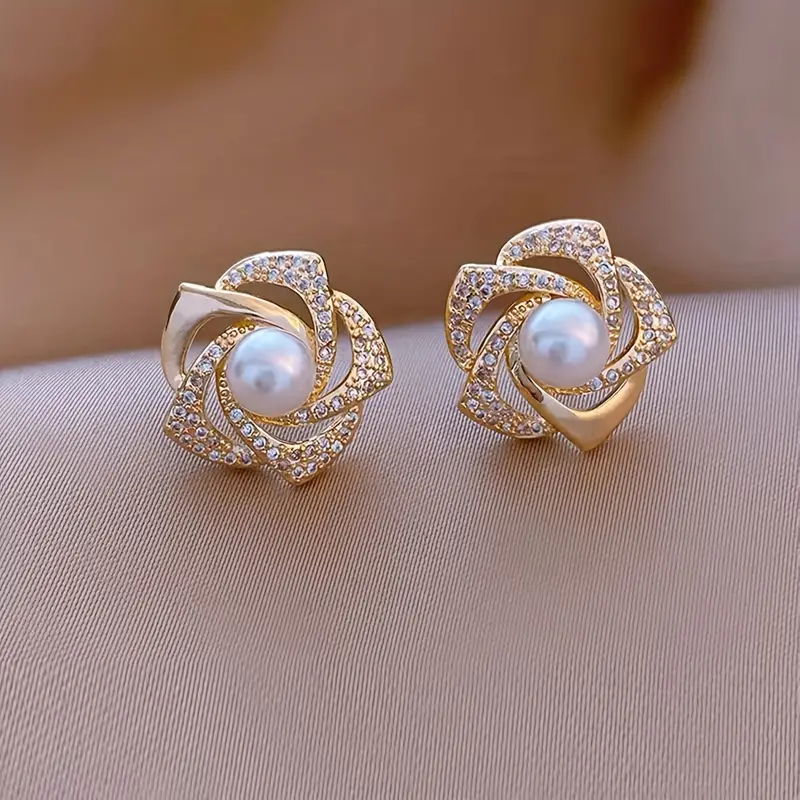 Elegant shimmering spiral pearl earrings