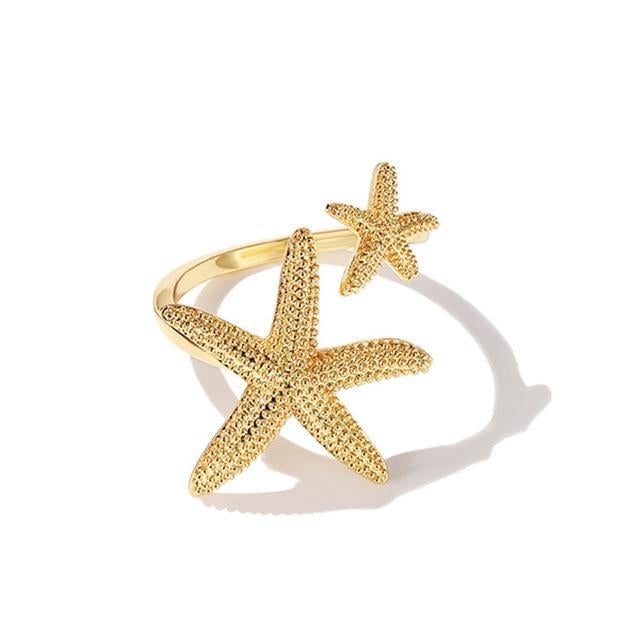 Adjustable silver and gold starfish ring